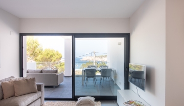 Resa Estates Ibiza te koop appartement Vadella Mar zee zicht woonkamer sea view.jpg